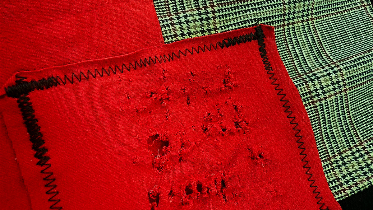 STITCHED BY HAND, NOT STAMPED OUT.